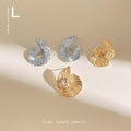 Ribbed Spiral Metal Stud Earrings Silver and Gold Tones view 1
