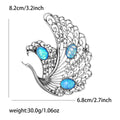 Openwork Swan Brooch In Metal With Filigree Wings And Three Iridescent Cabochons view 7