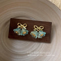 Gold Tone Bow Bell Flower Cluster Stud Earrings In Aqua And Pink view 4
