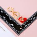 Christmas Stocking Reindeer Snowman and Hat Keychains with Red Loops view 4