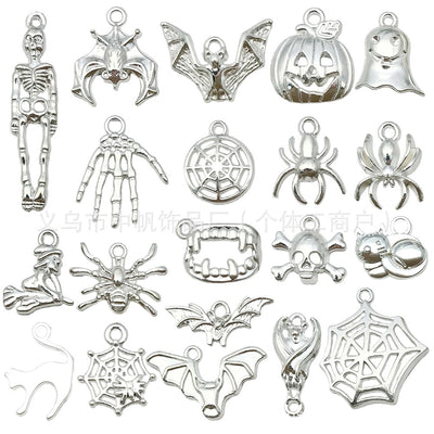 Metallic bat charms arranged on a light background
