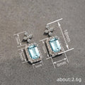 White Gold Light Blue Rectangle Halo Stud Earrings view 4