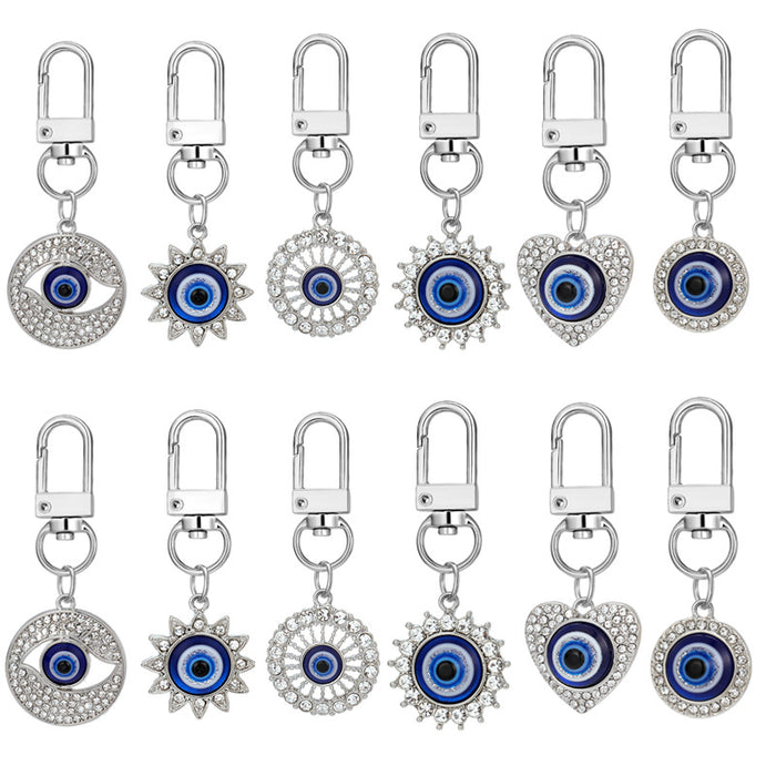 Twelve Piece Silver Tone Rhinestone Evil Eye Clip Keychain Set