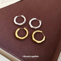 Rounded Sculpted Hoop Earrings In Gold And Silver Tones view 2