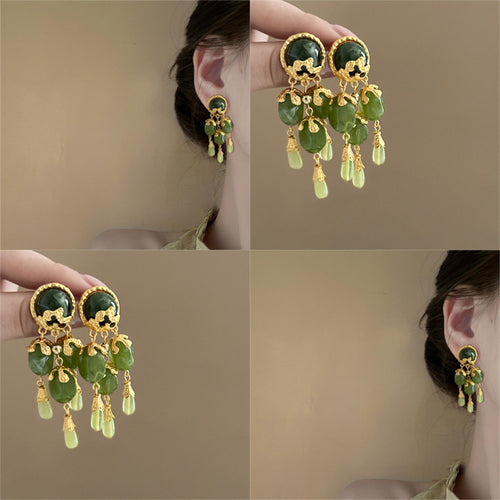 green vintage chandelier earrings shown in a clear product view