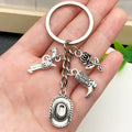 Antique Silver Cowboy Hat Boot and Pistol Keychain Set view 3