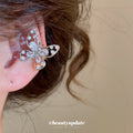 Openwork Crystal Butterfly Silver Tone Clip On Earrings view 3