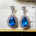Blue Teardrop Halo Stone Drop Earrings in Silver Tone view 5