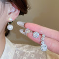Pearl Drop Clip Earrings and Crystal Square Stud Earrings view 2