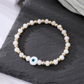 Gold Tone White Bead Colorful Evil Eye Stretch Bracelets view 4