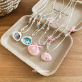 Coastal Beaded Pendant Necklaces in Four Pastel Shell and Ocean Styles view 2