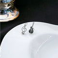 Mismatched Guitar and Treble Clef Silver Tone Stud Earrings view 2