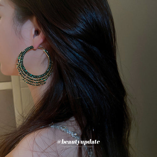 Antique Silver Layered Crystal Hoop Earrings Polished Metal Jewelry modeled at the ear