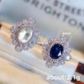 Silver Oval Floral Halo Stud Earrings Clear Blue Pair view 5