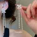 Silver Tone Butterfly and Crystal Strand Drop Earrings view 1