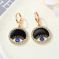 Gold Tone Ornate Crystal Evil Eye Huggie Drop Earrings in Seven Designs view 7