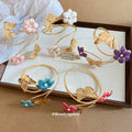 Gold Spiral Arm Cuffs Enamel Flowers Butterflies Five Colors view 2