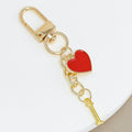 Gold-Tone Letter Charm Keychain with Red Heart Accent view 11