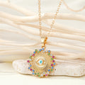 Gold Tone Round Crystal Evil Eye Pendant Necklaces in Two Designs view 3