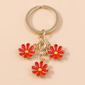 Enamel Daisy Flower Keychain with Three Charms on Split Key Ring view 11