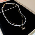 Pearl Like Bead Layered Necklace With Bow Charms Beaded Jewelry view 7