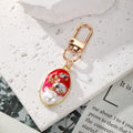 Gold Tone Pearl and Rhinestone Oval Clip Keychains in Six Colors view 6