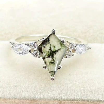 Front product shot of silver green moss kite stone ring