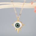 Gold Tone Spiked Eyeball Pendant Necklaces in Six Iris Colors view 6