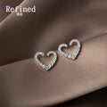 Silver Tone Hollow Heart Stud Earrings with Clear Crystal Pave view 4