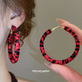 Animal Print Fabric Hoop Earrings In Three Colors With Fabric Wrapped Hoops view 3