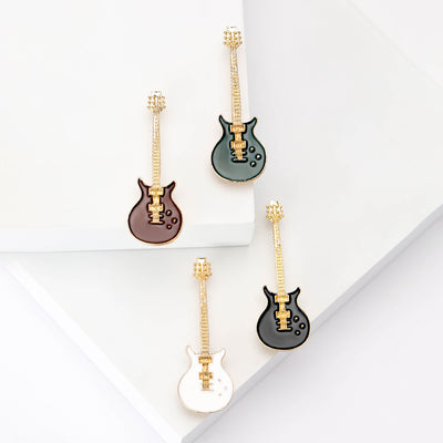 Four enamel electric guitar brooches white black green brown display