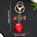 Six Red Rhinestone Cherry and Strawberry Metal Keychain Designs view 4