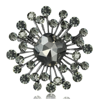 Smoke gray crystal starburst heart brooch close-up front