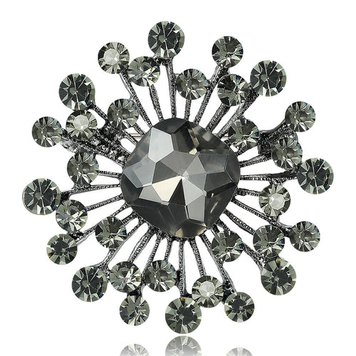 Smoke gray crystal starburst heart brooch close-up front
