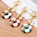 Layered Enamel Camellia Flower Keychains in Three Colors view 1