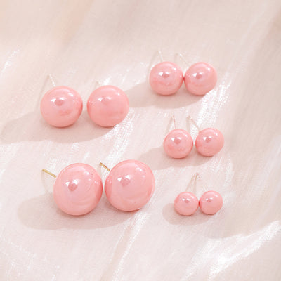 Primary supplied view of pink pearl-look round stud earrings