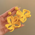 Woven Petal Flower Stud Earrings With Polished Metal Tone Details view 6