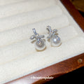 Silver Tone Crystal Bow and Cream Pearl Drop Stud Earrings view 4