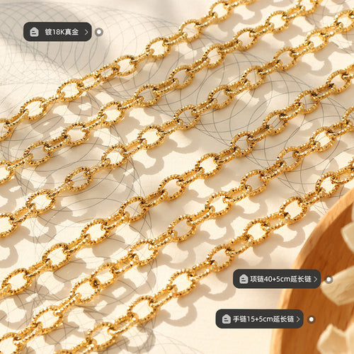 Gold textured oval link chains close-up with plating and length labels