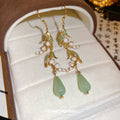 Gold Tone Leaf And Pale Green Teardrop Hook Earrings view 2