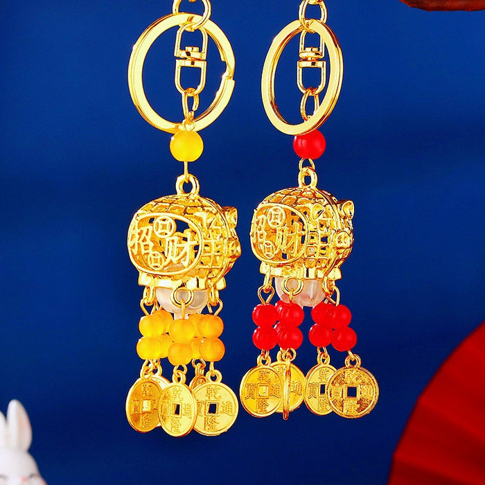 Illuminated Coin Lantern Keychains With Red or Yellow Bead Tassels