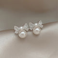 Silver Bow Pearl Stud Earrings with Crystal Accents view 6