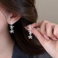 Silver Tone Open Flower Drop Earrings With Three Blooms view 3