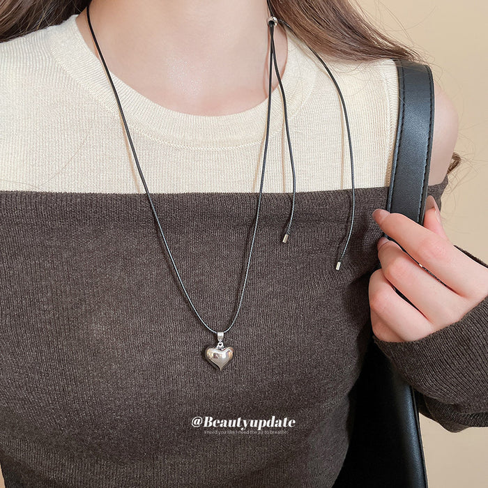 Silver Tone Puffy Heart Pendant Black Cord Necklace
