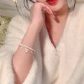 White Pearl Like Double Bracelet Set With Enamel Camellia Charm view 4