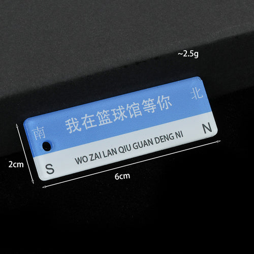 Blue and white basketball court sign charm shown with 6 cm length, 2 cm width and about 2.5 gram weight labels