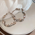 Twisted Metal Hoop Earrings in Gold Tone and Silver Tone view 7