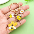 Bee and Honeycomb Charm Keychains Featuring Yellow Daisy Across 33 Pictured Variations view 1