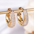 Wide Pave Hinged Hoop Earrings In Gold And Silver Tones view 1