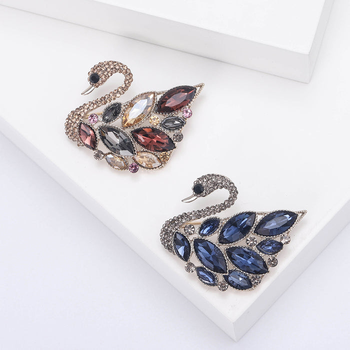 Crystal Swan Brooch with Layered Blue or Pink Wings